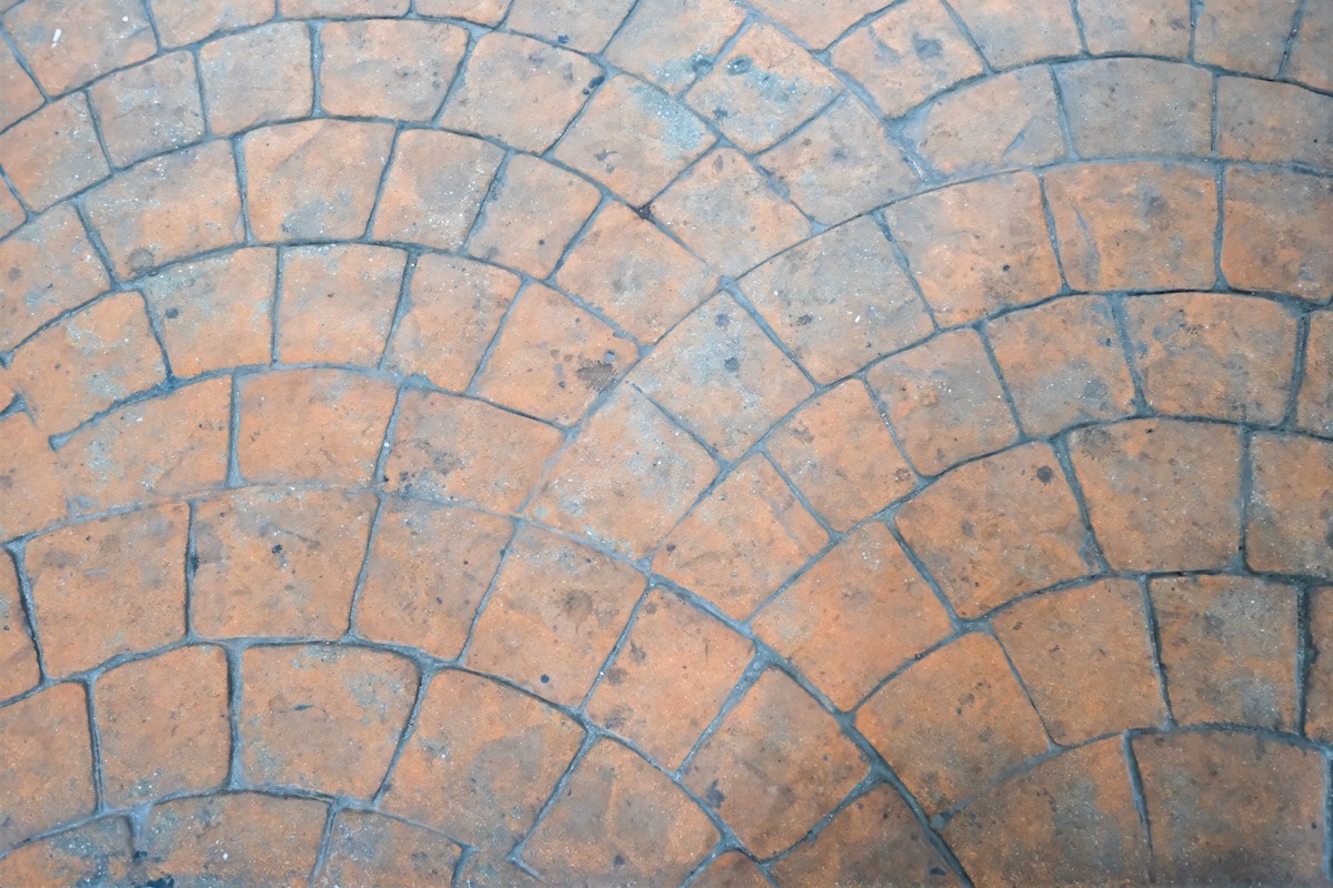 Stamped concrete patio with custom stone pattern